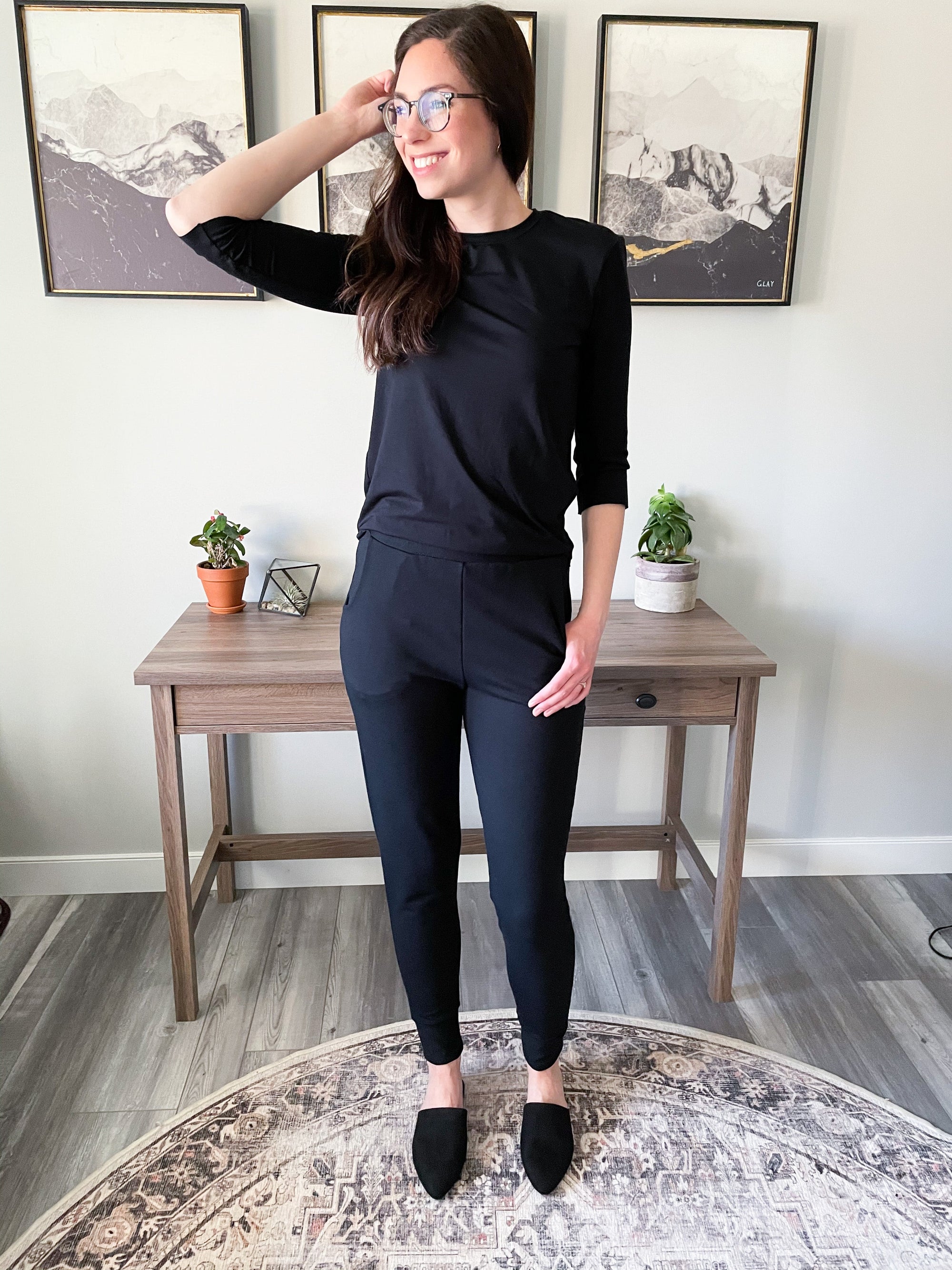 woman standing wearing bamboo tapered black joggers