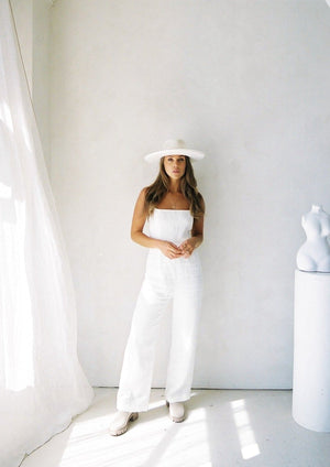 Our Marlo Jumpsuit in Coconut. The perfect transitional piece for every season. Coconut is an off-white.