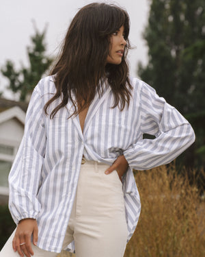vertical stripe blue and white button up blouse made from a linen and cotton blend