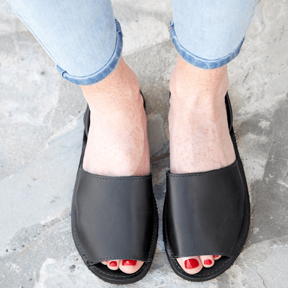 Front side view of the Avarca classic Spanish leather sandal sustainably made by Brave Soles in caramel color