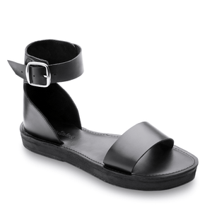 Top side view of the Camila Leather Flatform sandal that is ethically made by Brave Soles in Class black.