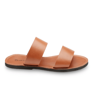 Side view of the Ophelia Leather slide sandals sustainably made by Brave Soles in caramel color