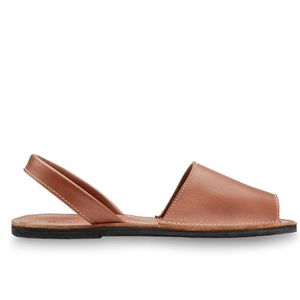 inner side view of the Avarca classic Spanish leather sandal sustainably made by Brave Soles in caramel color