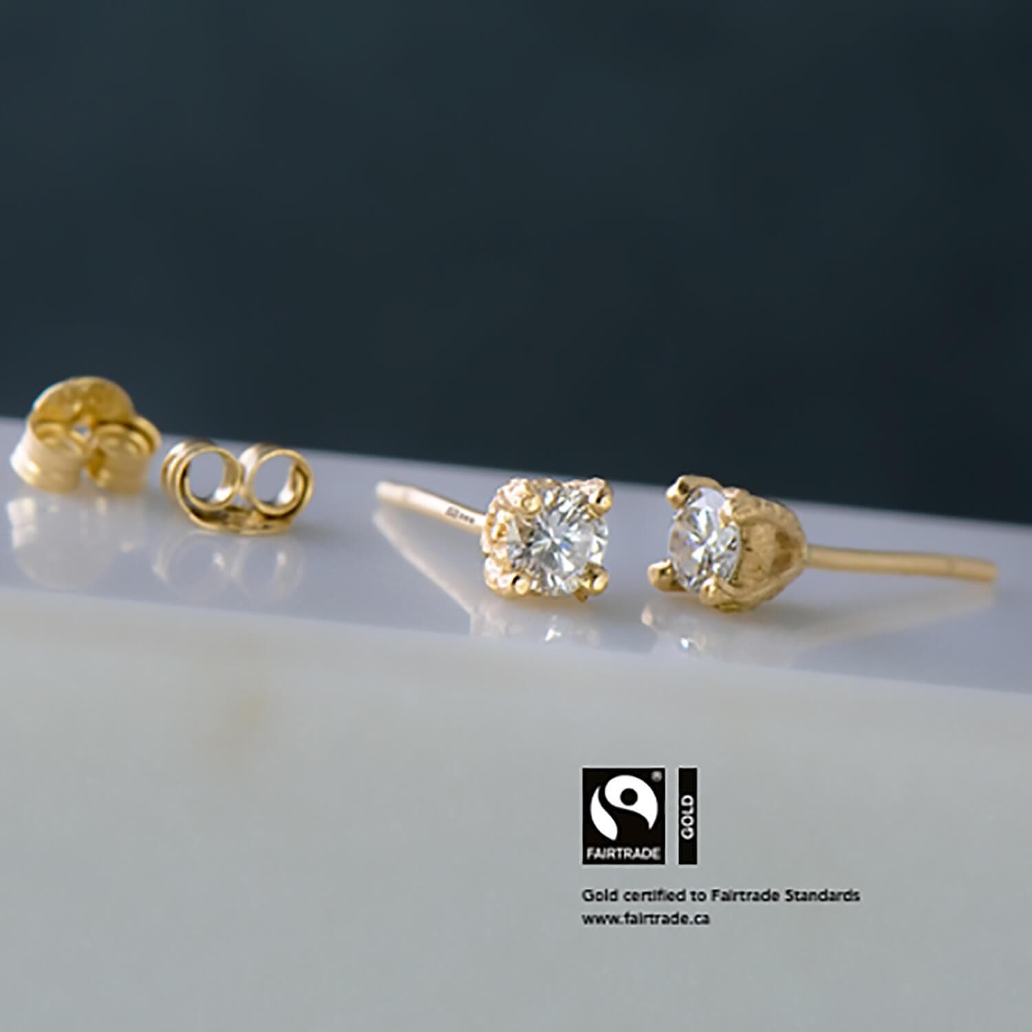 Baroque recycled diamond studs set in a four prong setting in 14 karat Fairtrade Certified gold. With a total diamond weight of 0.39 carats